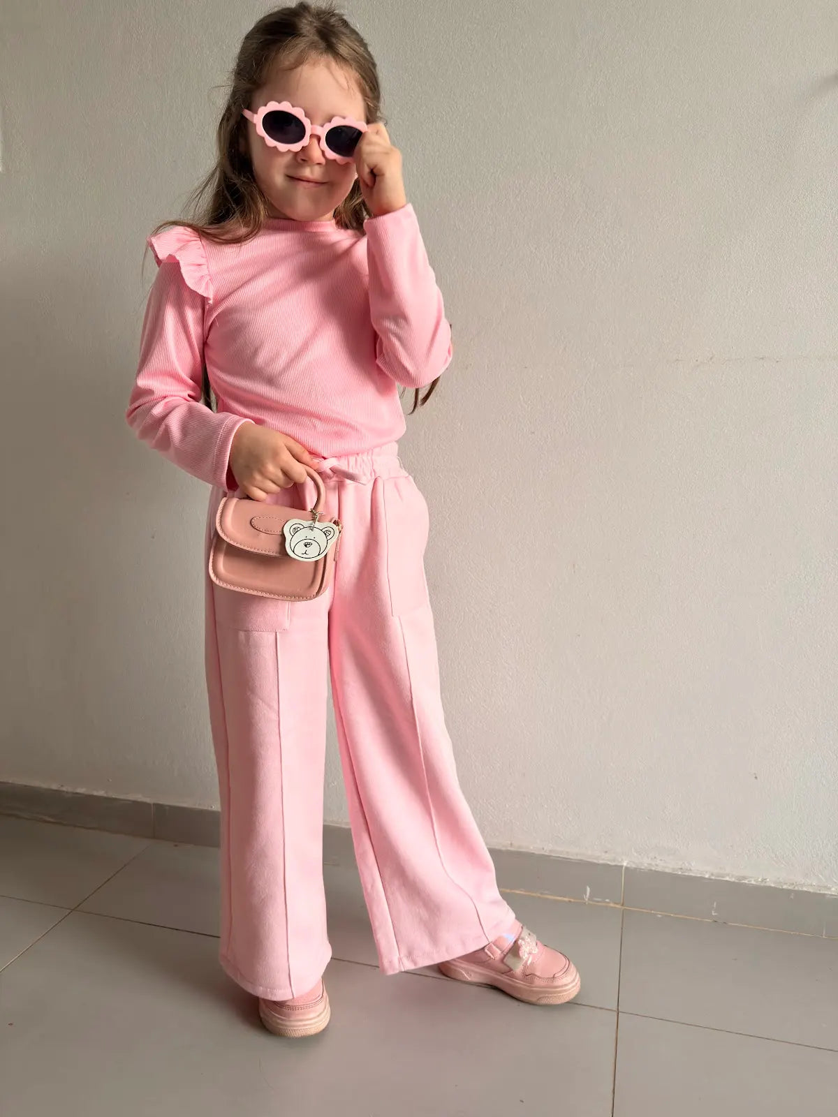 Blusa Infantil Manga Longa em Malha Canelada e Poliamida com Babados